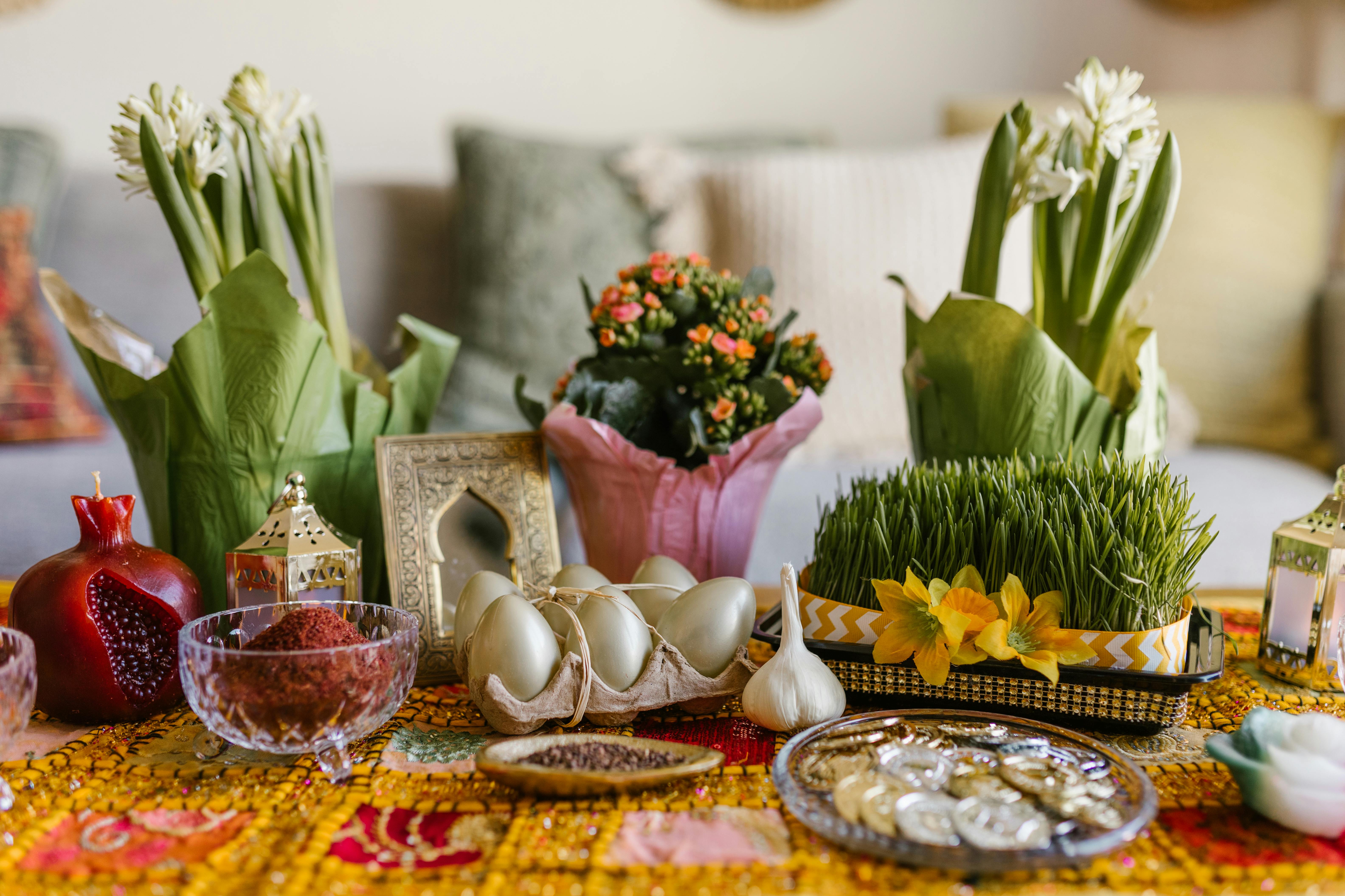 A range of flowers in baskets, eggs, spices, and garlic along with other items