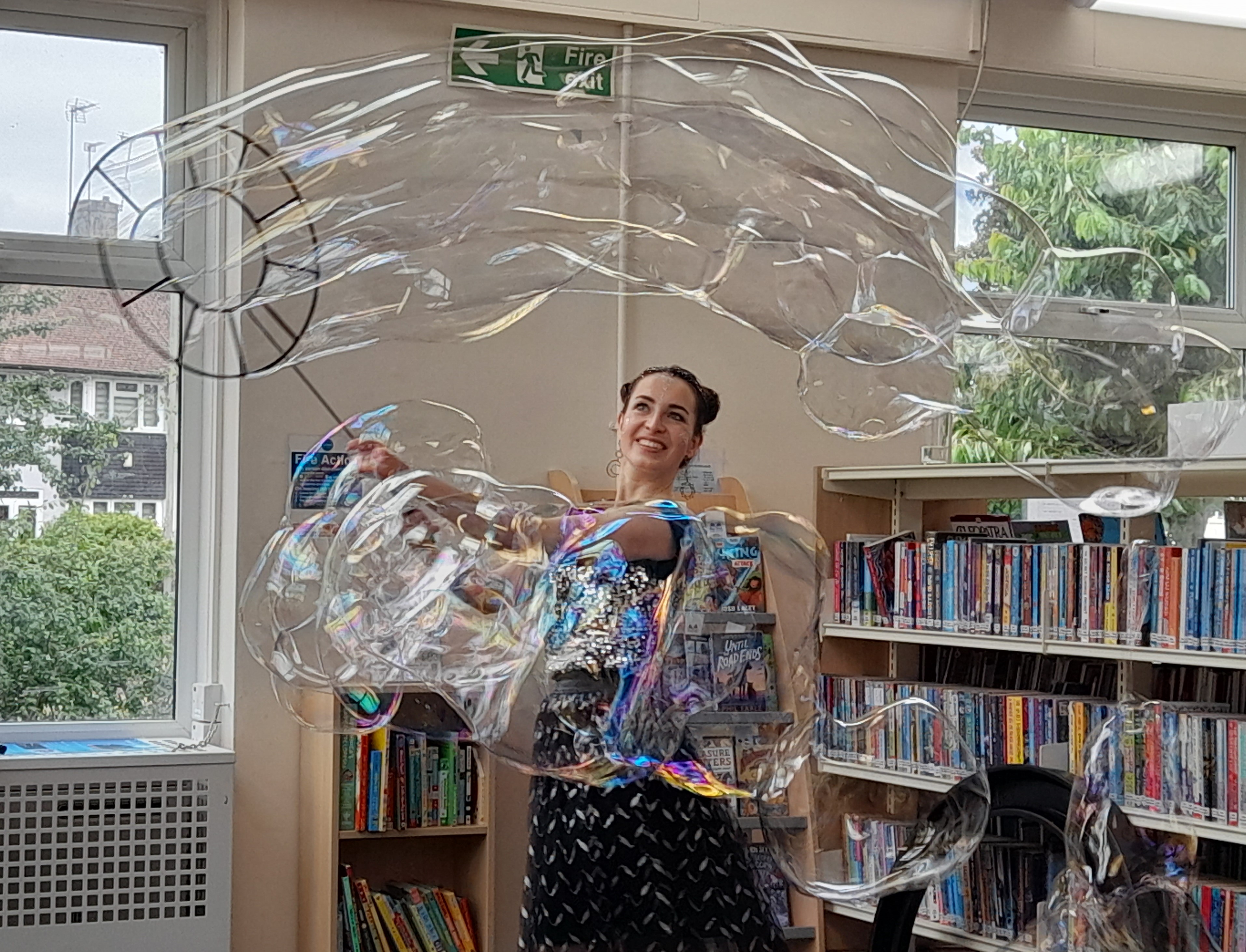 A lady making big bubbles