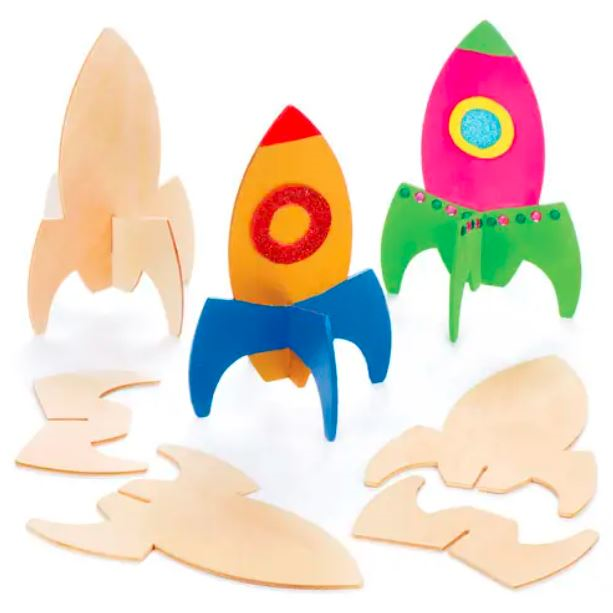 three wooden rockets