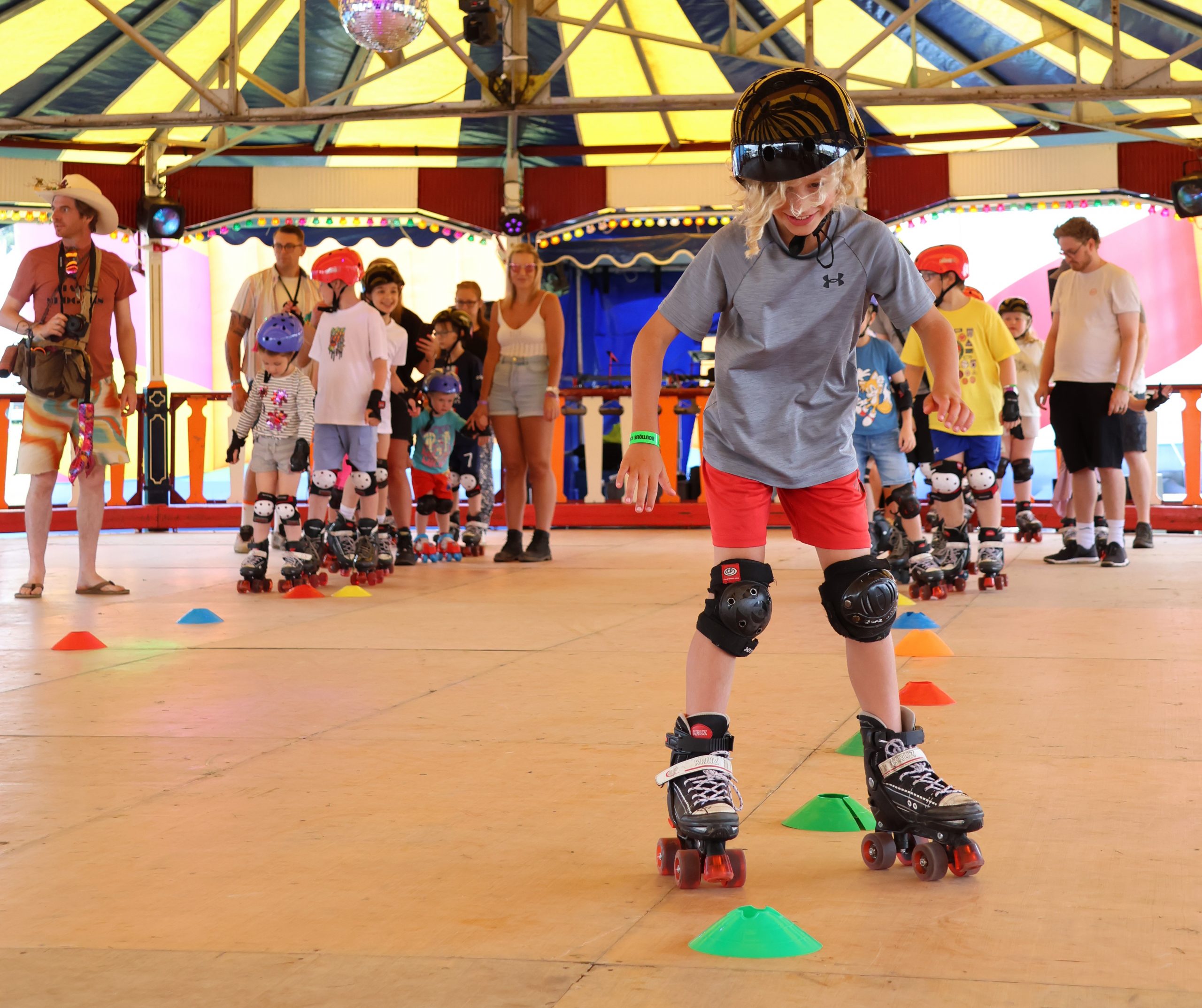 Families enjoying roller disco