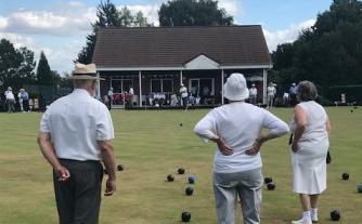 Older people planning bowls