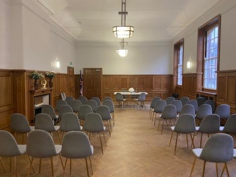 Room with 45 seats placed across the floor