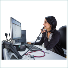 A GP at work at their desk