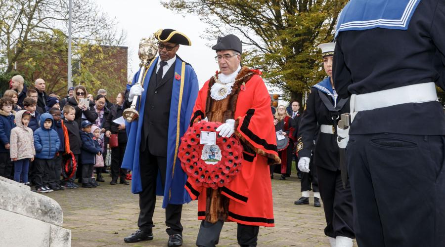 The Worshipful Mayor of Barnet, Cllr Tony Vourou, lays a wreath at Hendon War Memorial