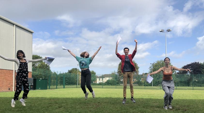 A socially distanced celebration: Students from the Archer Academy in East Finchley celebrate their fantastic GCSE results