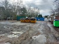 Sopers Yard, 155 Bell Lane, Hendon, was being used for multiple purposes including open-air storage, waste transfer and processing, and a used car sales lot without planning permission.